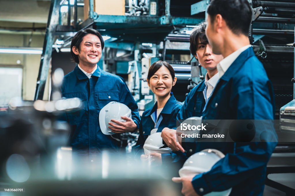 workers sharing information on site